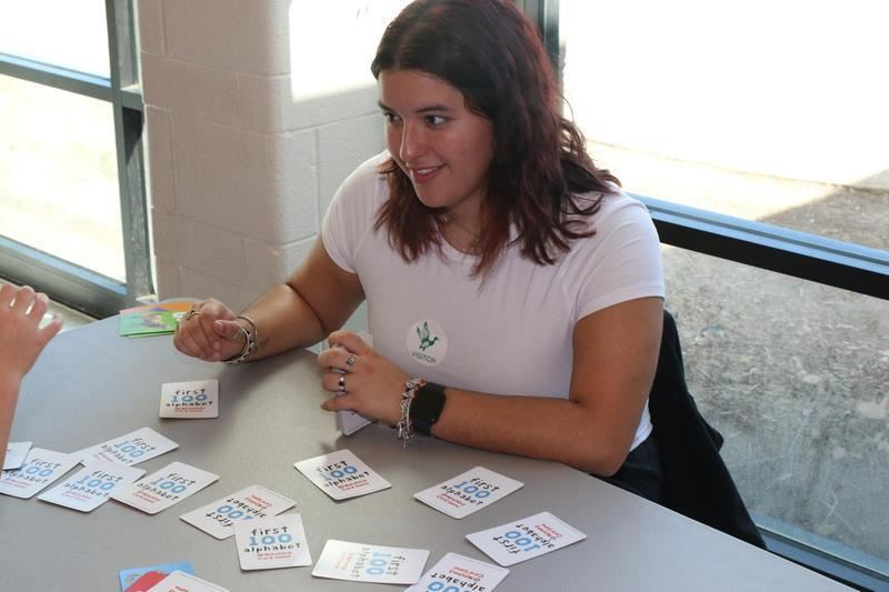 LECHS Student playing card game at table