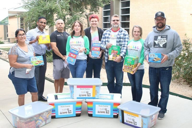 community members donating to the Duck Pantry
