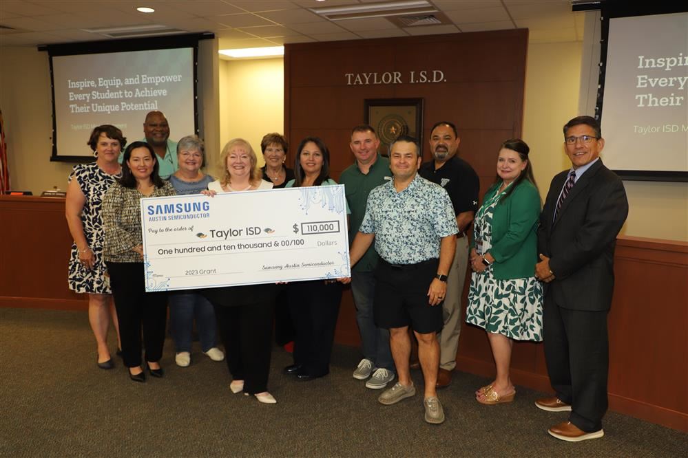  Group photo of check presentation